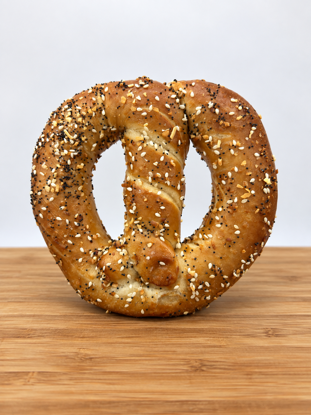 Single Everything Seasoned Soft Pretzel, shown unwrapped